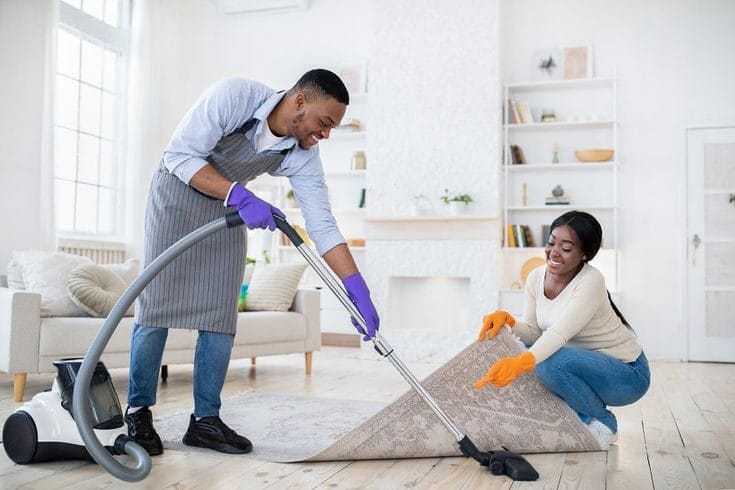 vacuuming under rug